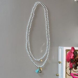 White necklace with embellishment